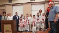 Başarılı sporcular Belediye Meclisinin konuğu oldu