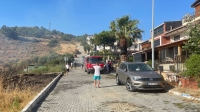 İzmir’de otomobilde çıkıp makilik alana sıçrayan yangın kontrol altında