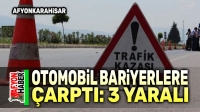 Afyon’da otomobil bariyerlere çarptı, 3 kişi yaralandı