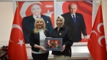 AK Partili kadınlardan MHP’li kadınlara ziyaret